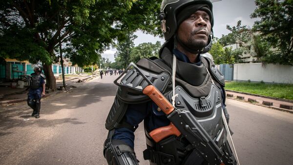Policier congolais d'une brigade anti-émeute après les élections présidentielles en RDC - Sputnik Afrique