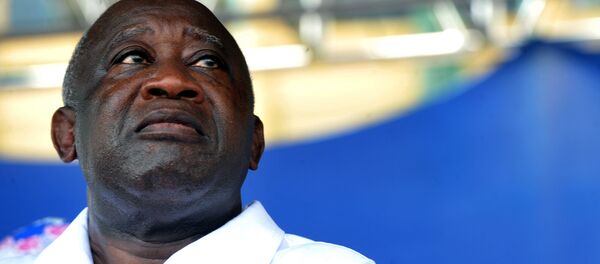 In this file photo taken on November 26, 2010 Ivory Coast's President and incumbent Laurent Gbagbo attends a campaign meeting in Abidjan. - Sputnik Afrique