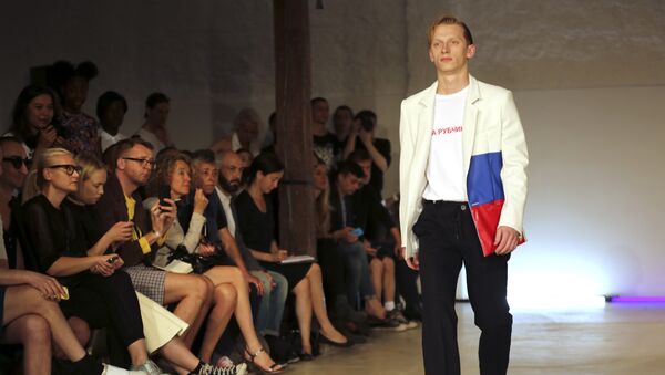 A model wears a creation for Gosha Rubchinskiy's Men's spring-summer 2015 fashion collection presented in Paris, France, Wednesday, June 25, 2014 - Sputnik Afrique