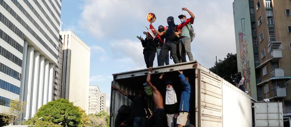 Une action de protestation au Venezuela (23 janvier 2019) - Sputnik Afrique