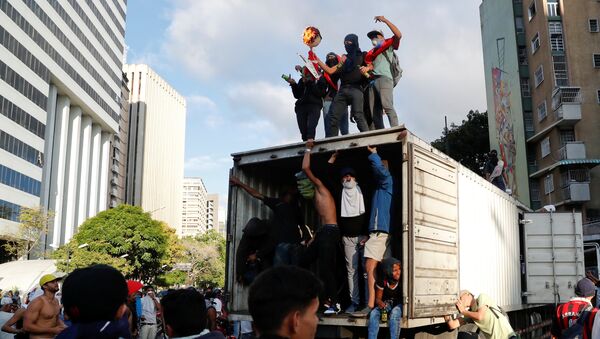 Une action de protestation au Venezuela (23 janvier 2019) - Sputnik Afrique
