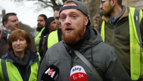 Maxime Nicolle aka Fly Rider, one of the Yellow Vest (Gilet Jaune) movement initiators, speaks to journalists during an anti-government demonstration called by the Yellow Vest movement, in Bourges, on January 12, 2019 - Sputnik Afrique