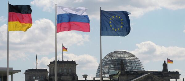 From left to right: Flags of Germany, Russia and the EU - Sputnik Afrique