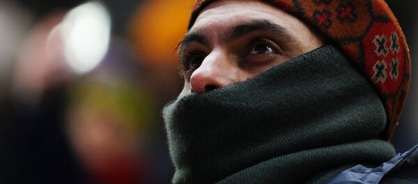 Un homme au cache-nez - Sputnik Afrique