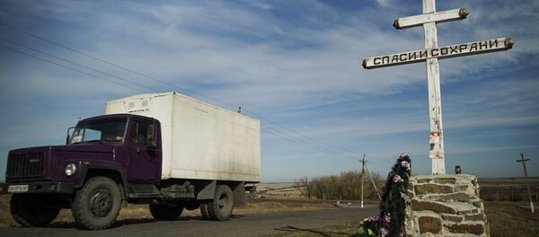 Un mémorial aux victimes du crash du Boeing MH17 au sud-est de l'Ukraine - Sputnik Afrique