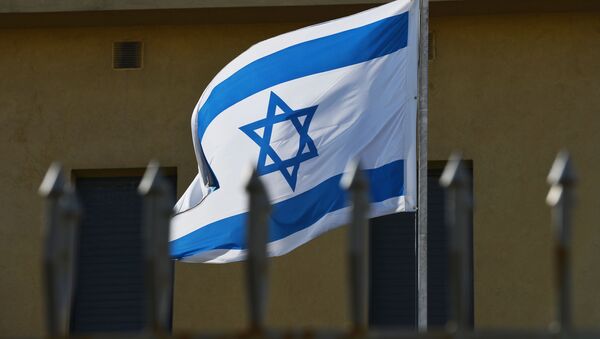 The flag on the premises of the Embassy of Israel in Moscow which has suspended its operations as the diplomats go on strike. - Sputnik Afrique
