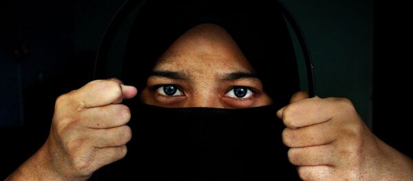 Une femme au hijab - Sputnik Afrique