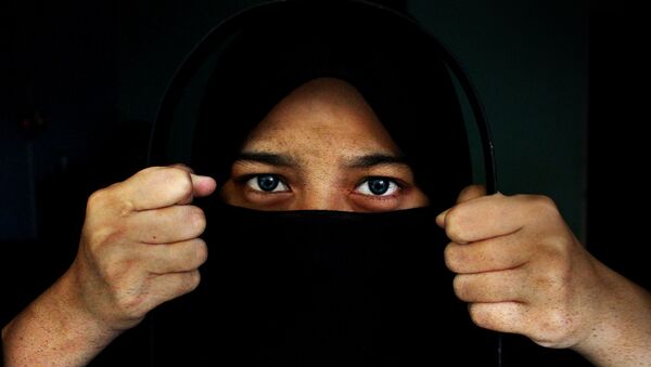 Une femme au niqab - Sputnik Afrique