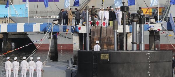 Le Président iranien Hassan Rohani assiste à la présentation du sous-marin Fateh, le dimanche 17 février 2019 - Sputnik Afrique