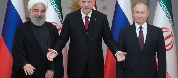 Hassan Rohani, Recep Tayyip Erdogan et Vladimir Poutine - Sputnik Afrique