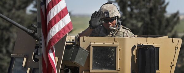 Un soldat US à Manbij, en Syrie - Sputnik Afrique