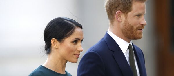 La exactriz estadounidense Meghan Markle y su marido, el príncipe Enrique - Sputnik Afrique