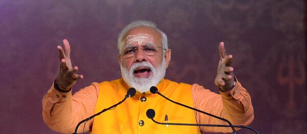 Indian Prime Minister Narendra Modi speaks during the Swachh Kumbh Swachh Aabhaar event organized by Ministry of Drinking Water & Sanitation at Ganga pandal during the Kumbh Mela festival in Allahabad on February 24, 2019 - Sputnik Afrique