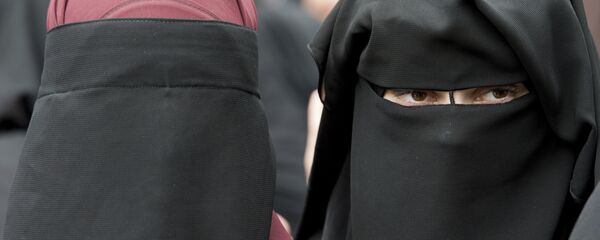 Une femme en niqab (photo d'archive) - Sputnik Afrique