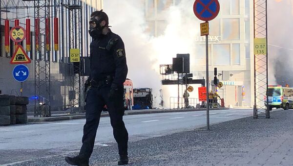 The site where a bus exploded and caught fire is seen in Tegelbacken in central Stockholm - Sputnik Afrique