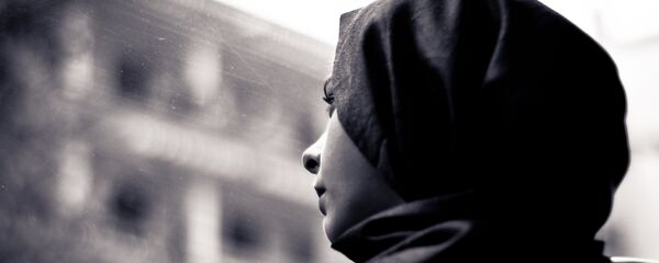 Une femme en hijab (image d'illustration) Une femme en hijab (image d'illustration) - Sputnik Afrique