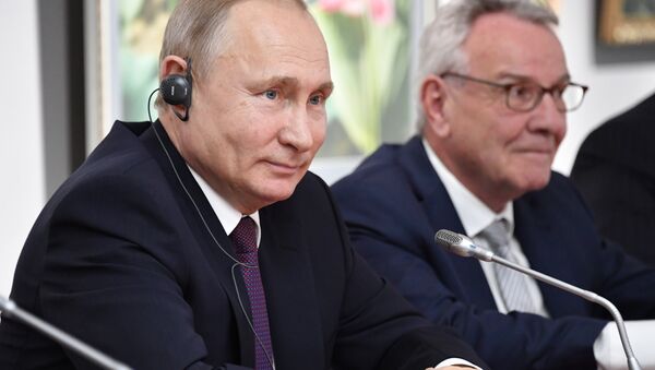 Vladimir Poutine lors d'une rencontre avec Thierry Mariani - Sputnik Afrique