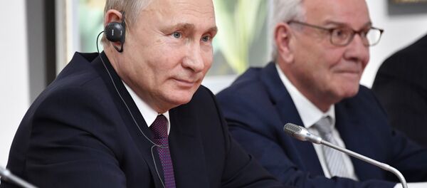 Vladimir Poutine lors d'une rencontre avec Thierry Mariani - Sputnik Afrique