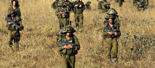 des soldats israéliens en exercice sur les hauteurs du Colan occupées des soldats israéliens en exercice sur les hauteurs du Colan occupées - Sputnik Afrique