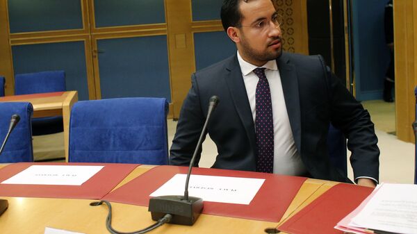 Former President Macron's security aide Alexandre Benalla, left, appears before the French Senate Laws Commission prior to his hearing, in Paris, France, Wednesday, Sept. 19, 2018. - Sputnik Afrique