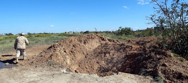 l'aéroport de Mitiga après les frappes aériennes effectuées par l'Armée nationale libyenne - Sputnik Afrique