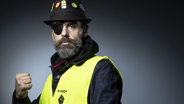 Jerome Rodrigues, one of the leading figures of the yellow vests (gilets jaunes) movement, poses during a photo session in Paris on February 6, 2019 - Sputnik Afrique