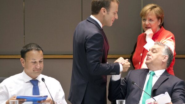  Emmanuel Macron, Viktor Orban et Angela Merkel en 2018 - Sputnik Afrique