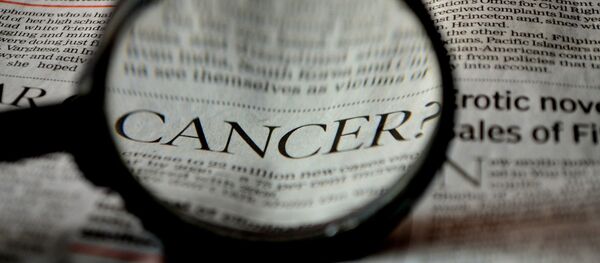 Un título de un periódico con la palabra 'Cáncer' (imagen referencial) - Sputnik Afrique