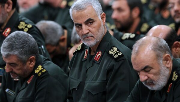 A handout picture released on September 18, 2016 by the official website of the Centre for Preserving and Publishing the Works of Iran's supreme leader Ayatollah Ali Khamenei shows the Quds Force commander Major General, Qassem Suleimani (C), attending a meeting of Revolutionary Guard's commanders in Tehran - Sputnik Afrique