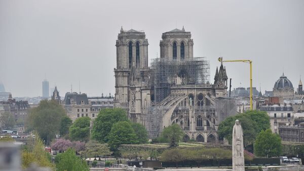 La cathédrale Notre-Dame de Paris après l'incendie, vue du toit de l’Institut du monde arabe, 16 avril 2019 - Sputnik Afrique