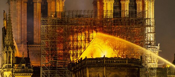 Notre-Dame de Paris en flammes Notre-Dame de Paris en flammes - Sputnik Afrique