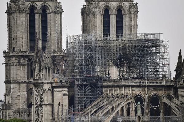 La cathédrale Notre-Dame de Paris après l'incendie La cathédrale Notre-Dame de Paris après l'incendie - Sputnik Afrique
