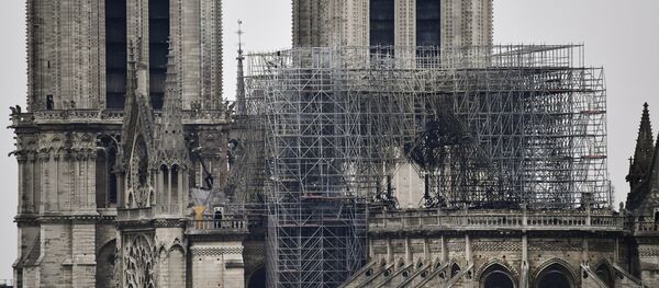La cathédrale Notre-Dame de Paris après l'incendie La cathédrale Notre-Dame de Paris après l'incendie - Sputnik Afrique