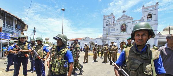 Sri Lankan Army soldiers secure the area around St. Anthony Shrine after a blast in Colombo, Sri Lanka, Sunday, April 21, 2019. - Sputnik Afrique
