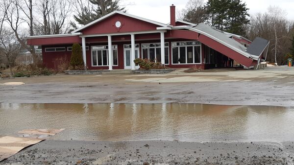 Une maison endommagée par les inondations, sur la rue Notre-Dame à Sainte-Marie de Beauce.  - Sputnik Afrique