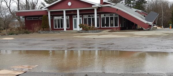 Une maison endommagée par les inondations, sur la rue Notre-Dame à Sainte-Marie de Beauce. - Sputnik Afrique