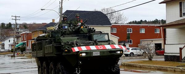 Un char d'assaut de l'armée canadienne dans les rues de Sainte-Marie, au Québec. - Sputnik Afrique