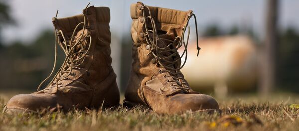 Botas militares de EEUU, foto archivo Botas militares de EEUU, foto archivo - Sputnik Afrique