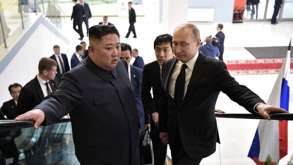Vladimir Poutine et Kim Jong-un - Sputnik Afrique