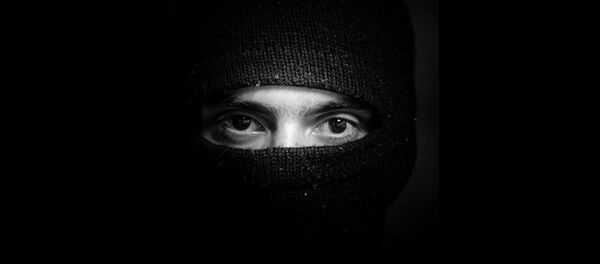 Un homme encagoulé (Image d'illustration) - Sputnik Afrique