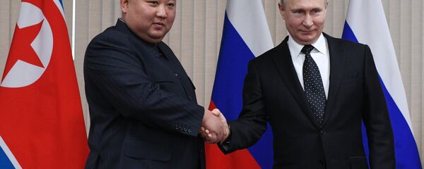 Kim Jong-un et Vladimir Poutine - Sputnik Afrique