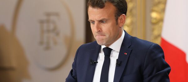 French President Emmanuel Macron reacts during his live address following the Great National Debate, at the Elysee Palace in Paris on April 25, 2019. - Sputnik Afrique