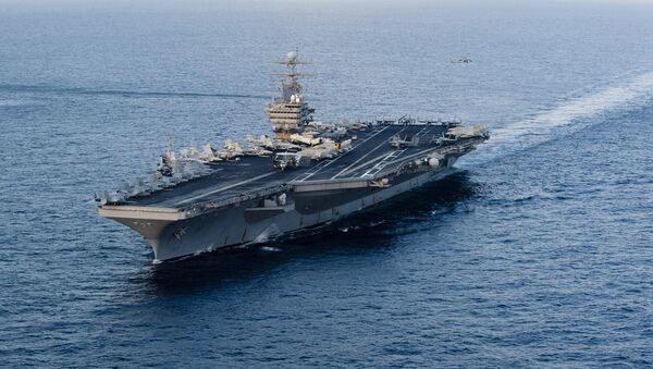 This January 19, 2012 image provided by the US Navy, shows the Nimitz-class aircraft carrier USS Abraham Lincoln (CVN 72) transiting the Arabian Sea. - Sputnik Afrique