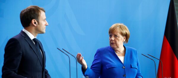 Emmanuel Macron et Angela Merkel à Berlin - Sputnik Afrique