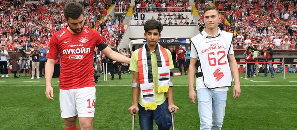 El niño de la foto ganadora del concurso Andréi Stenin 2018, Kasim Alkadim El niño de la foto ganadora del concurso Andréi Stenin 2018, Kasim Alkadim - Sputnik Afrique