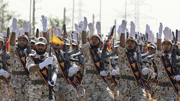 Iran's Revolutionary Guard members march during armed forces parade marking the anniversary of the start of the 1980-88 Iraq-Iran war, in front of the shrine of the late revolutionary founder Ayatollah Khomeini, just outside Tehran, Iran - Sputnik Afrique