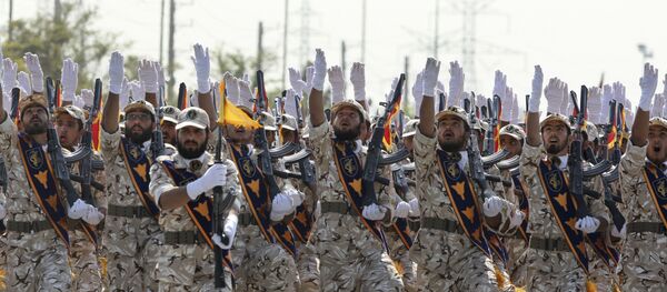 Iran's Revolutionary Guard members march during armed forces parade marking the anniversary of the start of the 1980-88 Iraq-Iran war, in front of the shrine of the late revolutionary founder Ayatollah Khomeini, just outside Tehran, Iran - Sputnik Afrique