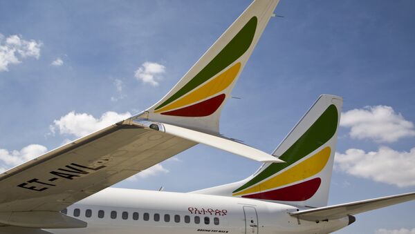 The winglet of an Ethiopian Airlines Boeing 737 Max 8 is seen as it sits grounded at Bole International Airport in Addis Ababa, Ethiopia Saturday, March 23, 2019 - Sputnik Afrique