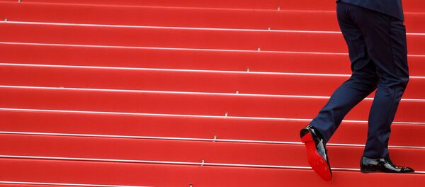 Гость на красной дорожке 71-го Каннского международного кинофестиваля - Sputnik Afrique