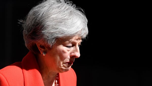 British Prime Minister Theresa May reacts as she delivers a statement in London, Britain, May 24, 2019 - Sputnik Afrique